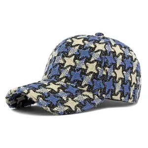 Thick warm houndstooth knit baseball cap in blue and black tweed for women