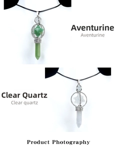Close-up of Green Aventurine and Clear Quartz Merkaba pendants with silver cage
