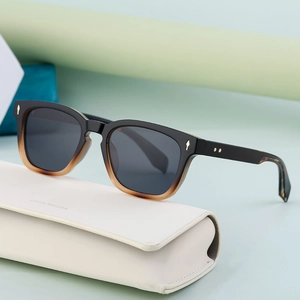 Classic square polarized sunglasses in black and tortoiseshell with cream leather case
