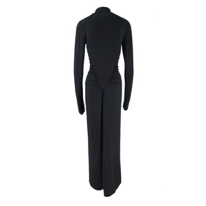 Detailed back view of a black high-neck maxi dress with ruched waist and long sleeves