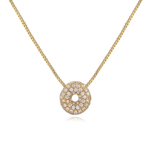 Macro detail of gold-plated copper pendant with micro-paved cubic zirconia and box chain