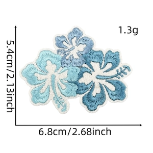 Blue hibiscus flower embroidery patch detail showing size measurements and sharp 3D texture
