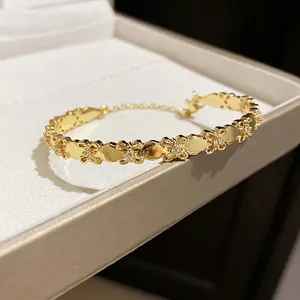 18k gold plated iris open cuff bracelet with zircon accents and a floral vintage design