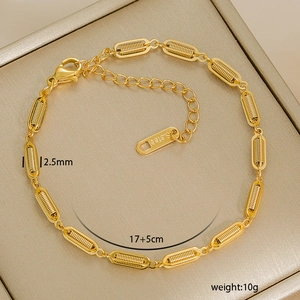 Detail of 2.5mm gold beaded chain with lobster clasp and adjustable extension link