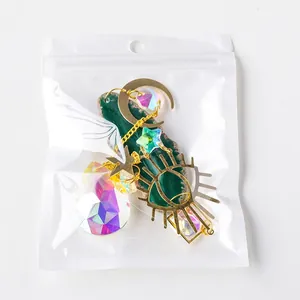 Agate crystal suncatcher with moon and star pendants in individual PP bag packaging