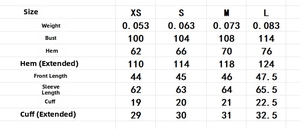 Detailed size guide table for Bohemian ruffled shirt and long skirt two-piece set
