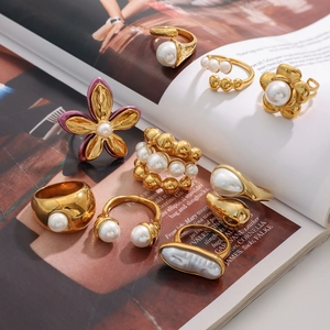 Luxury 9-piece gold stainless steel ring set with assorted pearls and floral designs