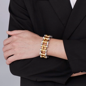 Men's 22mm stainless steel bicycle chain bracelet in gold and silver finish on wrist