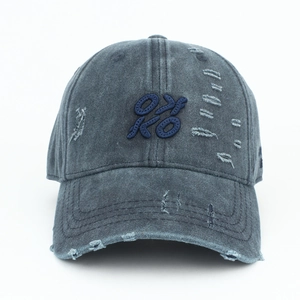Detail of distressed dark grey baseball cap featuring vintage 3D embroidery and frayed edges