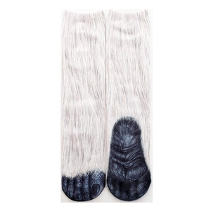 Detail shot of 3D animal paw socks featuring realistic gorilla hair and foot print patterns