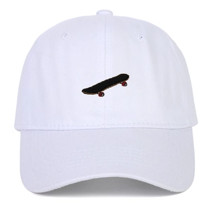 White cotton baseball cap with skateboard embroidery in minimalist streetwear style