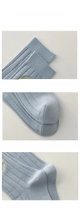 Detail view showing elastic ribbed cuff reinforced toe and ergonomic heel of cotton sock