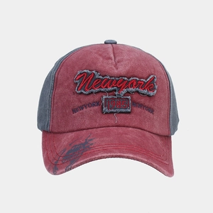 Detailed front view of washed cotton baseball cap with New York 1985 embroidery patch