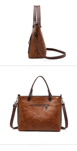 Detailed views of vintage brown PU tote bag with metal zippers and adjustable strap