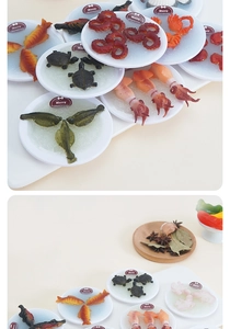 Gedetailleerde miniatuurzeevruchten met krab en octopus op feestelijke witte borden
