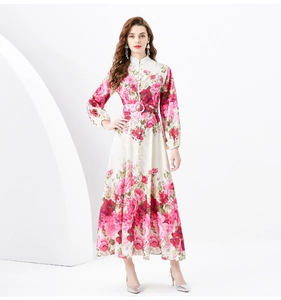 Close-up of vintage floral maxi dress featuring a stand collar and button-up front detail