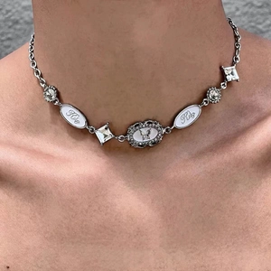 Y2K punk choker necklace with Kiko enamel, butterfly pendant and white crystal details