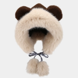 Winter plush trapper hat with fox ears and fur pom-poms in beige and brown