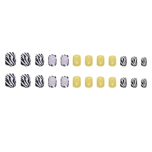 Set of 24 short press-on nails featuring yellow, zebra print, and cow pattern designs