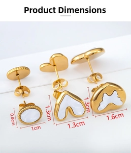 Detail view of gold stainless steel earrings with shell inlay and product dimensions