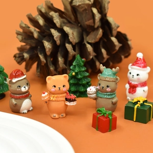 3D resin Christmas bears and small gift box ornaments with festive pine cone background