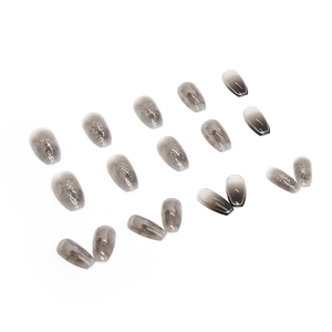 Dark mystic grey cat eye and marble press-on nails in coffin shape medium length