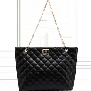 Elegant black quilted tote bag featuring a gold chain strap and metallic twist lock clasp