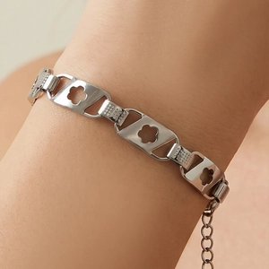 Bracelet à breloques fleurs évidées en acier inoxydable argenté avec chaîne ajustable