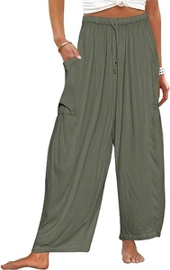 Détail du pantalon sarouel en lin vert olive avec taille élastique à cordon et grandes poches