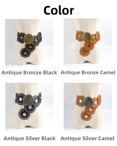Detail view of western vintage belts with hammered metal buckles and studded leather pieces