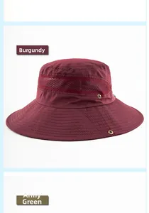 Detail of outdoor sun hats in wine red and army green with mesh vents and wide brims