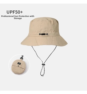 Detail of khaki outdoor bucket hat with UPF50+ protection and integrated packable pouch