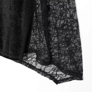 Elegant black velvet and lace halter midi dress showing rich fabric textures and details