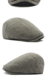 Close-up of gray knit ivy cap showing detailed geometric texture and retro style