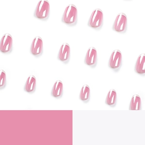 Glossy pink French tip press-on nails with white edges in a classic oval shape