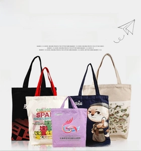 Detailed set of canvas tote bags with diverse art prints and sturdy carrying handles