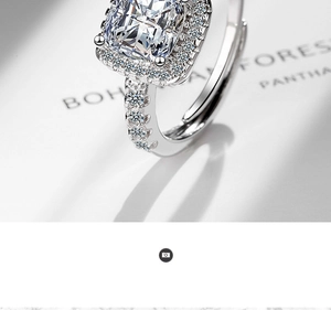 Macro detail of square-cut halo cubic zirconia ring with diamond-set band in silver