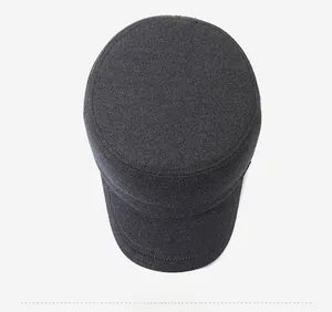 Top view of dark grey flat top military style cap with premium twill fabric texture