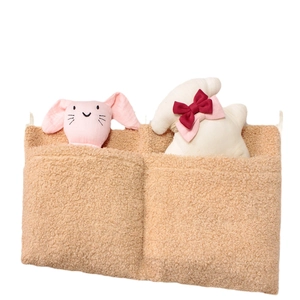 Brown teddy fleece baby crib organizer with double pockets and plush rabbit decoration