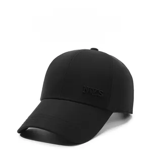 Detailed close-up of NYS embroidery on the side of a black cotton baseball cap