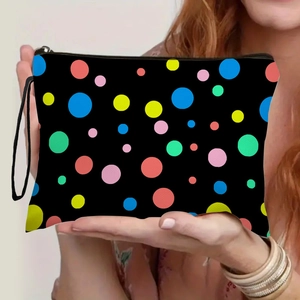 Trousse de maquillage noire à pois colorés avec fermeture éclair et dragonne de main