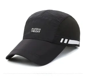 Side view of black quick-dry sport cap with mesh vents and white stripe detailing