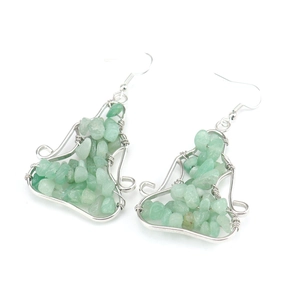 Detail of handmade wire wrapped green aventurine earrings with silver wire craftsmanship