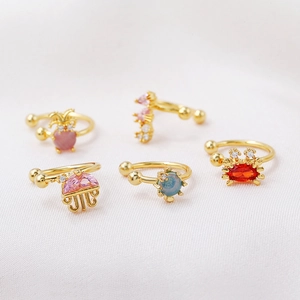 Golden ocean series ear bone clips featuring colorful crab, jellyfish, and turtle designs