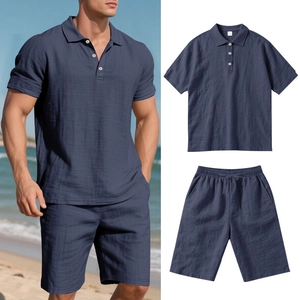 Detail of navy blue linen polo and shorts set showing waffle texture and beach style
