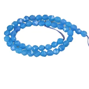 Faceted bright blue agate beads for jewelry making with polished geometric surfaces