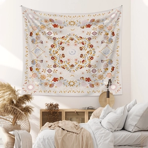 Detailed close-up of Bohemian sun and moon tapestry patterns on premium woven fabric