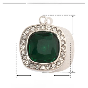 Macro detail showing dimensions 15mm x 13mm of green gemstone star pendant in steel