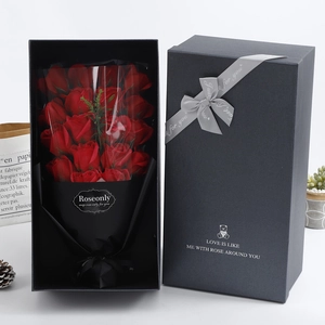 Detailed view of 18 red soap roses in a grey luxury gift box with a silk ribbon
