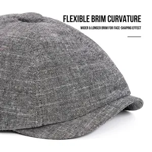 Gray textured newsboy cap with flexible brim and wide sun visor for face shaping
